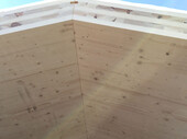 Snapshot of the construction work: Cutting together the roof panels in the ridge area