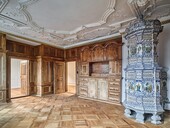Beautiful tiled stove and stucco ceilings, photo: Roger Frei
