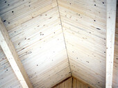 Construction du toit avec des modules d'empilage de planches optiholz