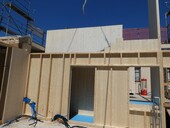 Assembly of wooden construction elements