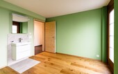 The replacement building contains bright rooms for assisted living and a guest apartment.