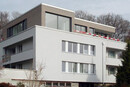 Renovation/addition of storeys to MFH Heizenholz